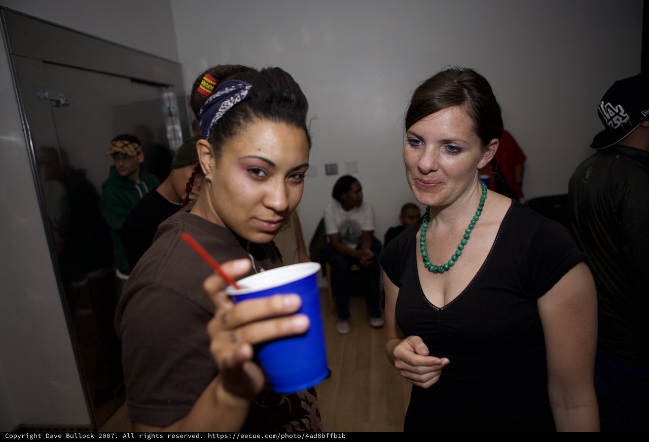 Two Women Sharing a Moment at a Dubstep Party