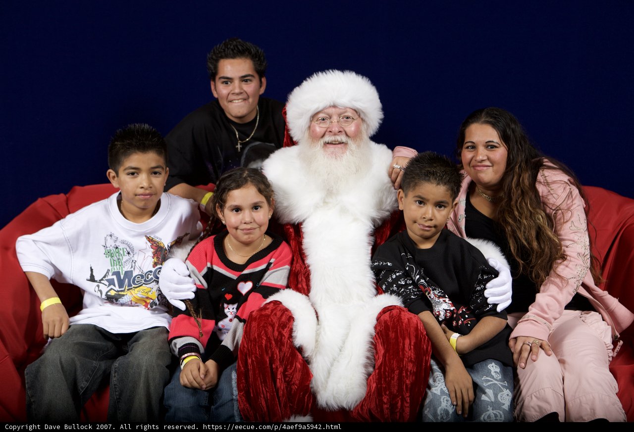 A Festive Family Portrait with Santa Claus