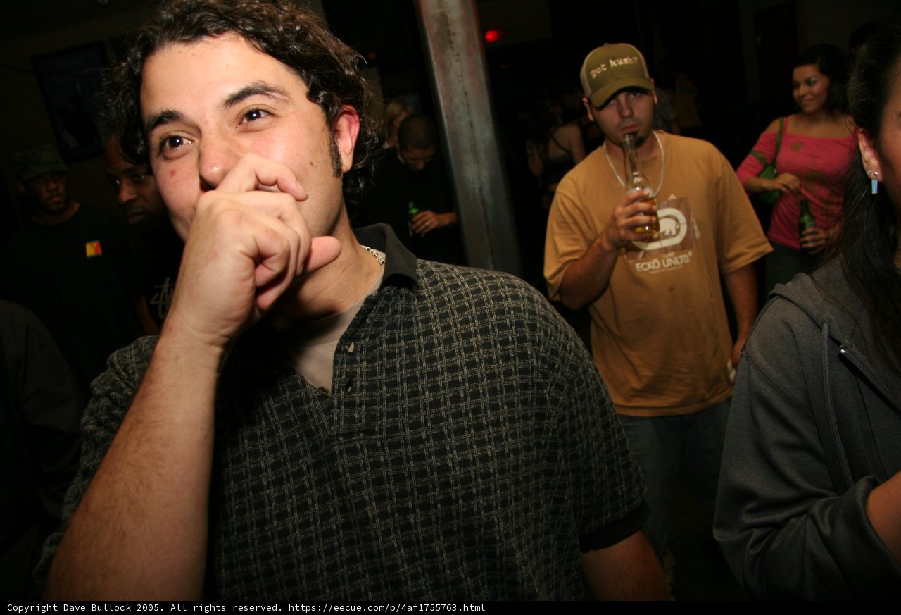 Black-Shirted Man at the Pub