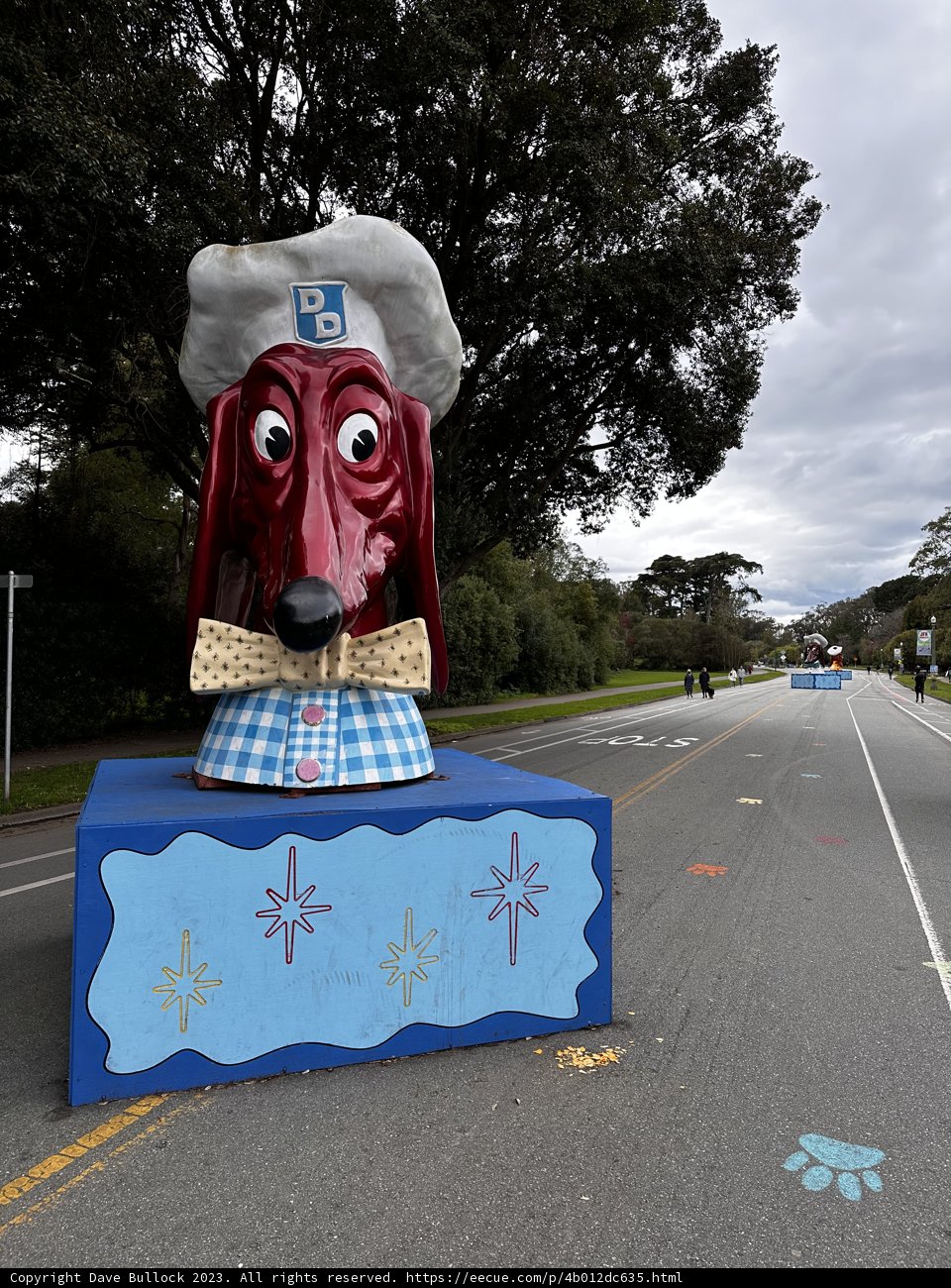 The Majestic Dog Statue on the Tarmac Road