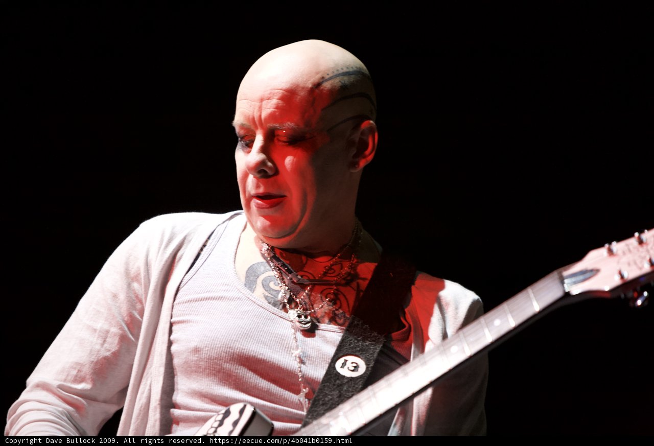 Bald and Bold Guitar Performance
