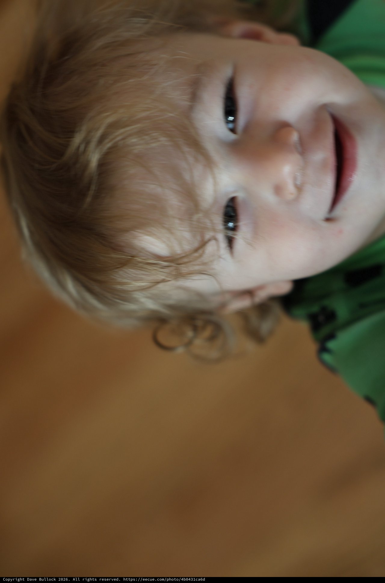 Young Child's Playful Upside-Down Portrait