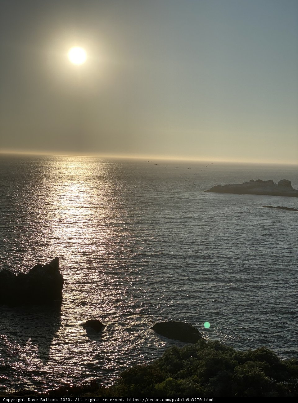 Radiant Sunset over the Coastal Rocks