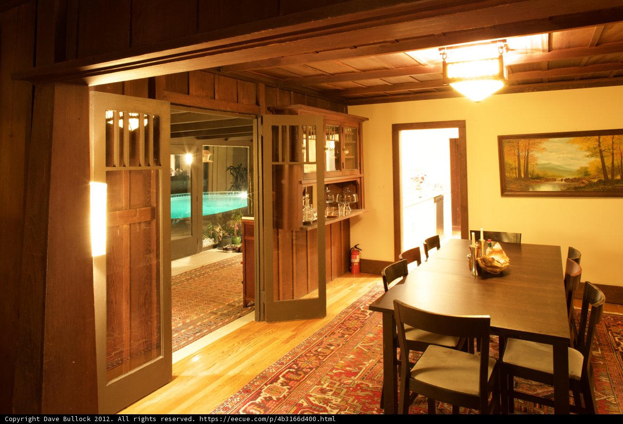 Rustic Dining Room with Hardwood Flooring