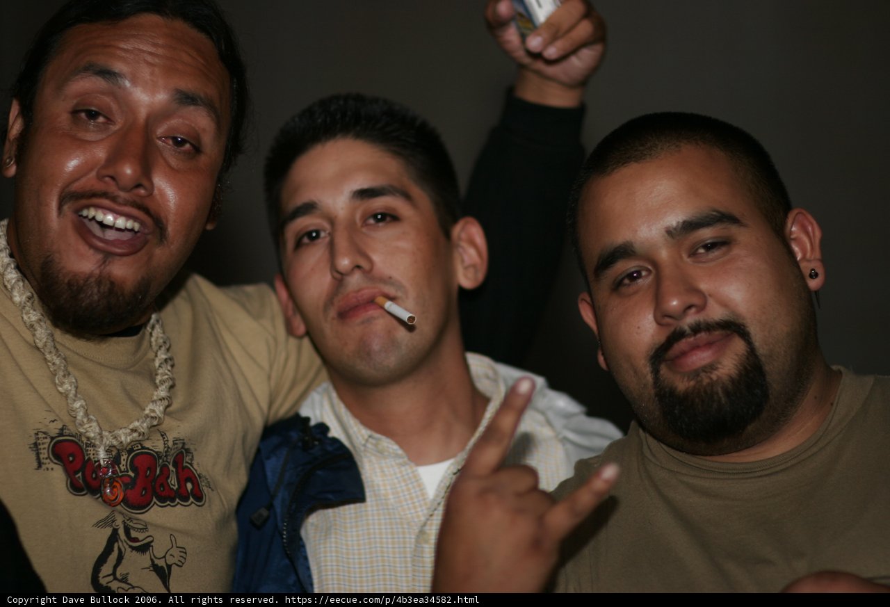Three Men Strike a Pose