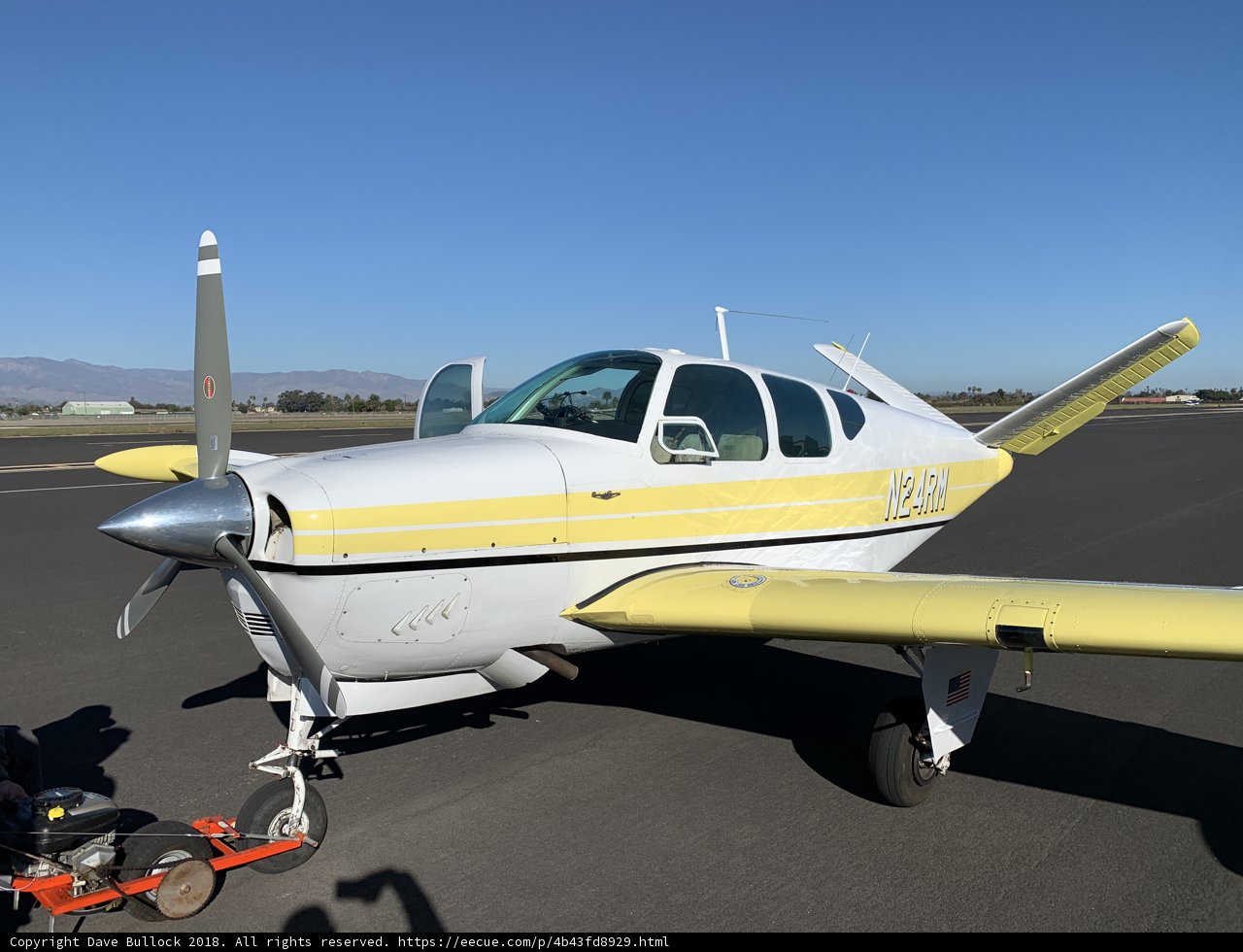 Parked Airplane with Maintenance Crew
