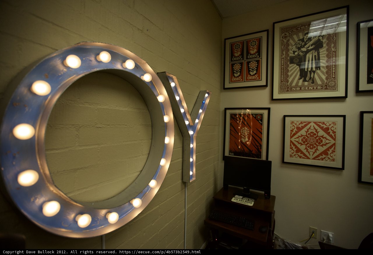 Illuminated 'y' Sign in Artistic Frame