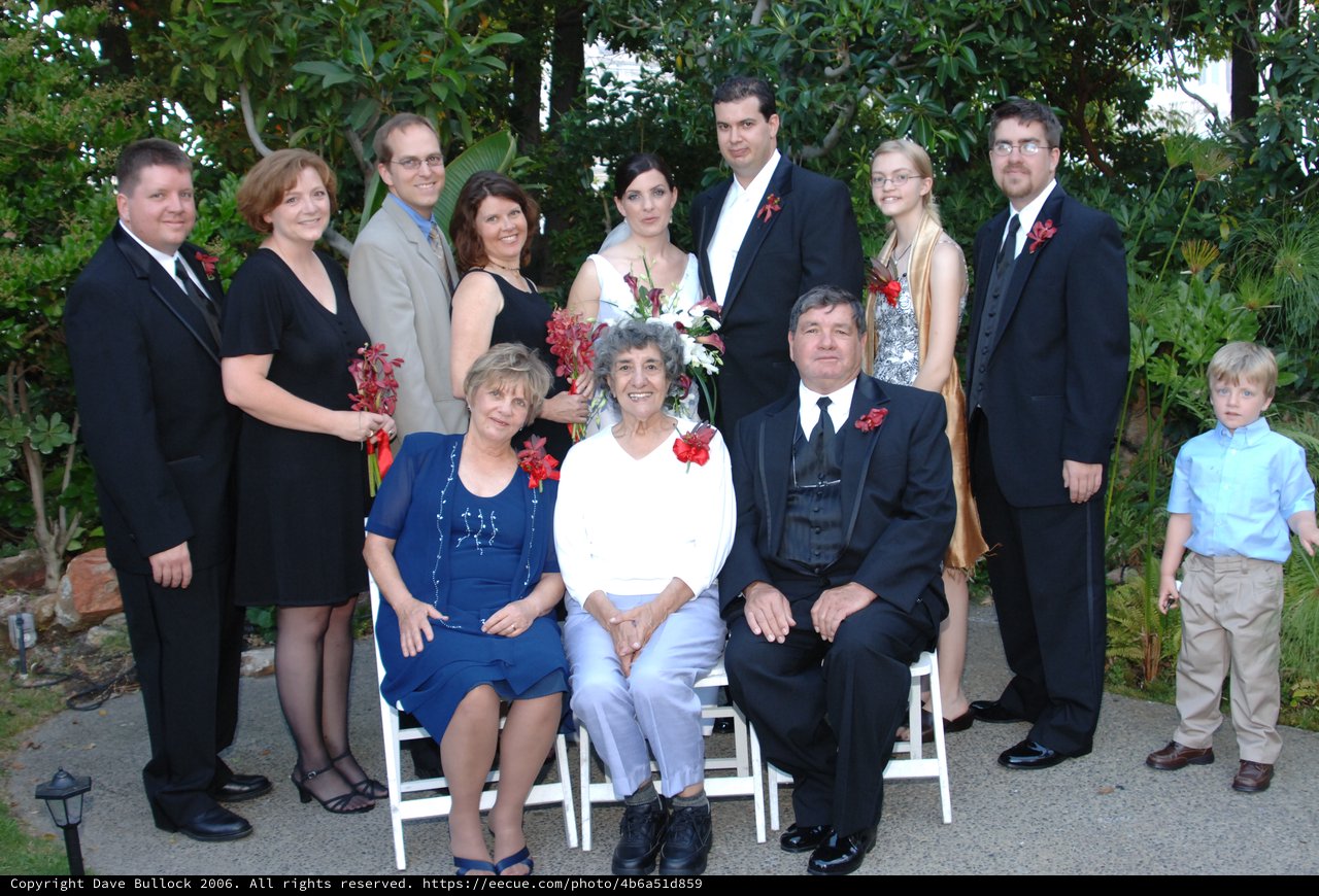 Family Wedding Portrait in Lush Garden Setting