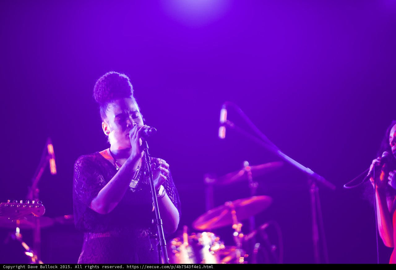Solange Backing Vocalist Updo Eyes Closed Singing Drum Kit Purple