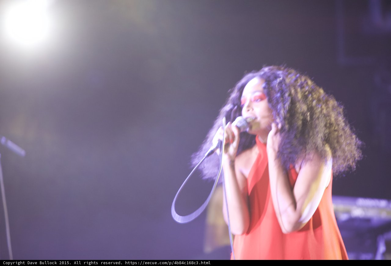 Solange Singing Hand Raised Face Intimate Purple