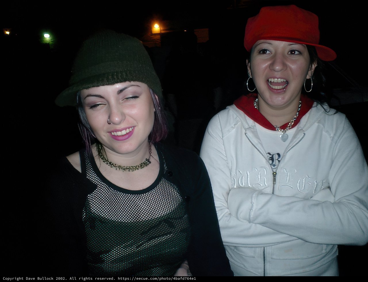 Two Women Rocking Their Hats