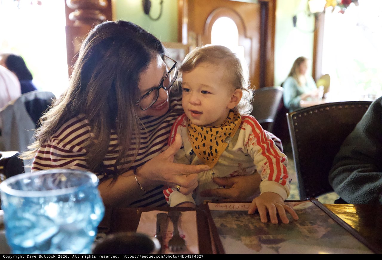 Mother and Child Sharing a Moment at Restaurant