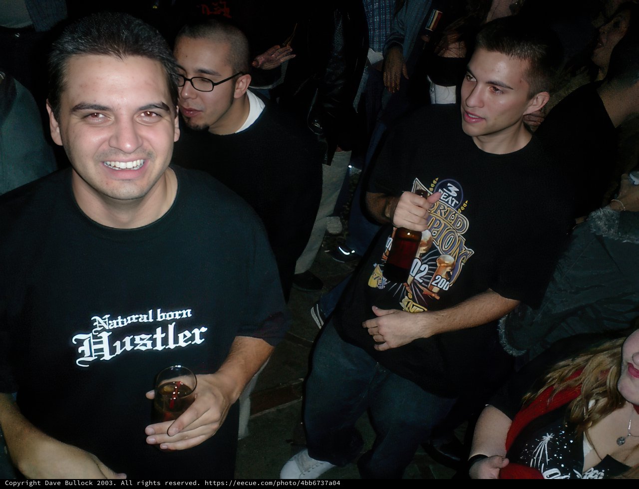 Black Shirted Man Enjoying a Beer at the Pub