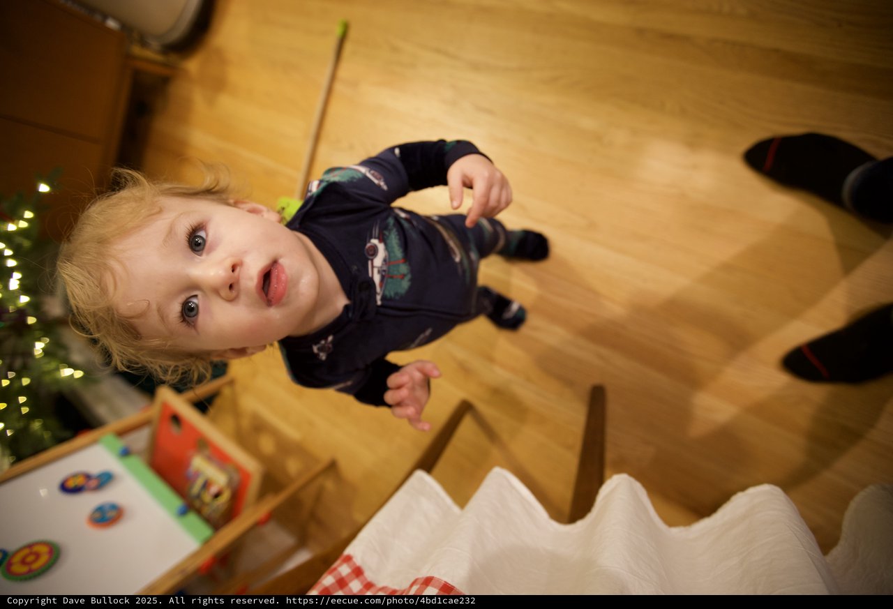 Young Child Playing with Toys on Christmas Morning