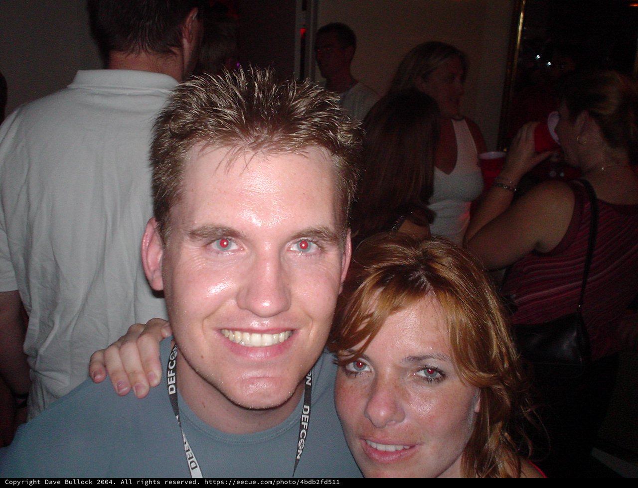 DEFCON 2004 Party Night with Two Smiling Attendees