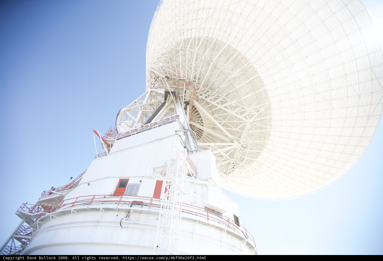 Red Roofed Satellite Dish Reaches to the Sky