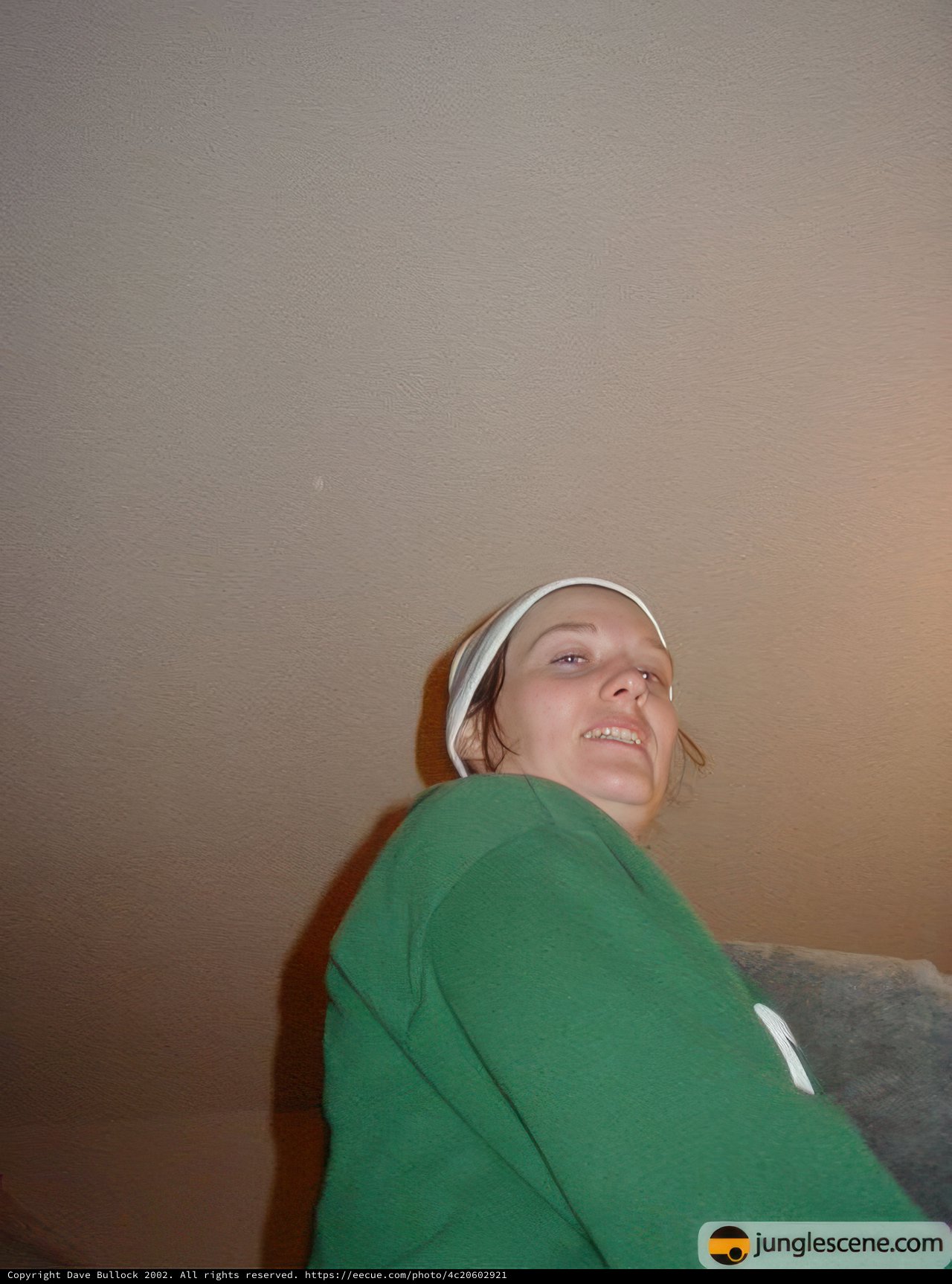 Green Shirt and White Hat