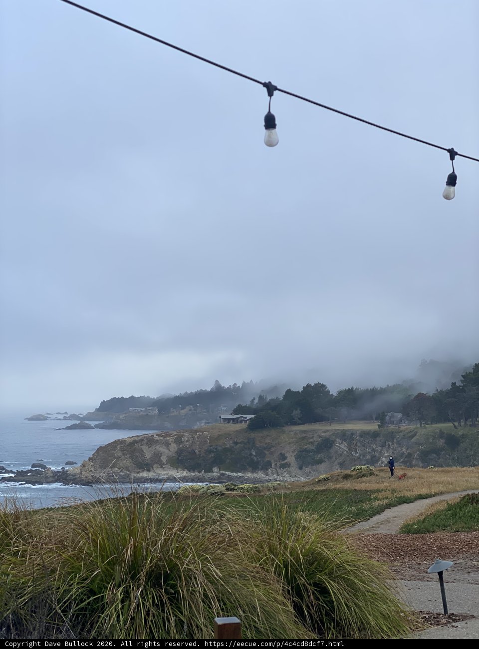 A Foggy Ocean Day by the Lighthouse