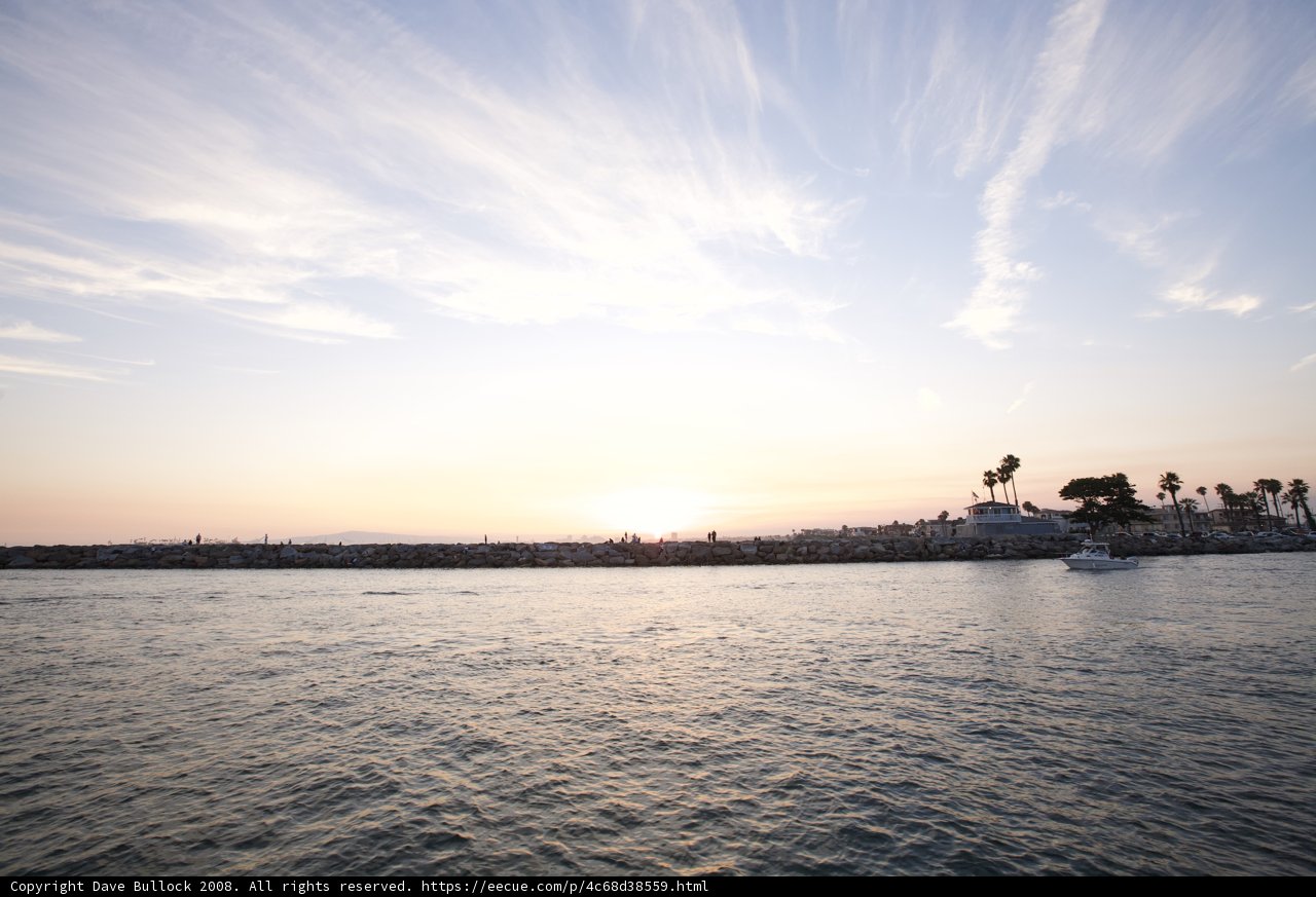 Serene Sunset over Lake with Boat