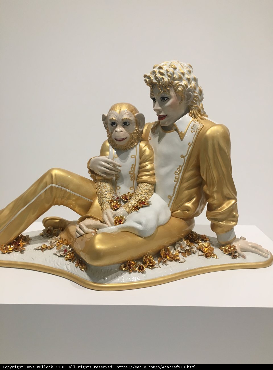 Golden Figurine of a Man and Monkey