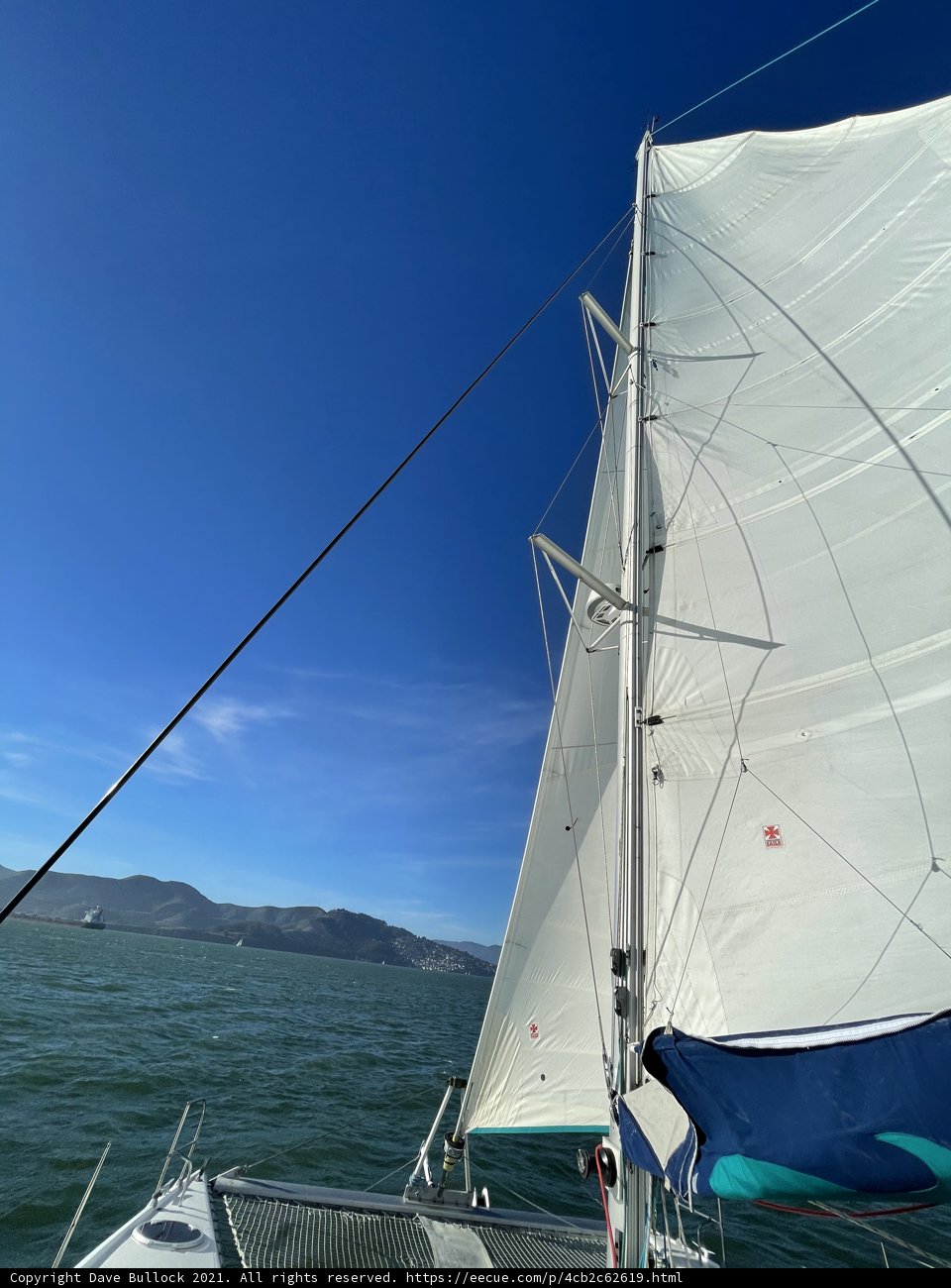 Sailboat Cutting Through the Bay