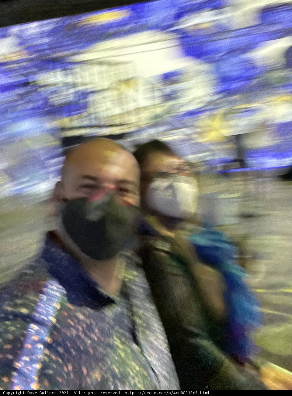 Masked Pair Against Blue and White