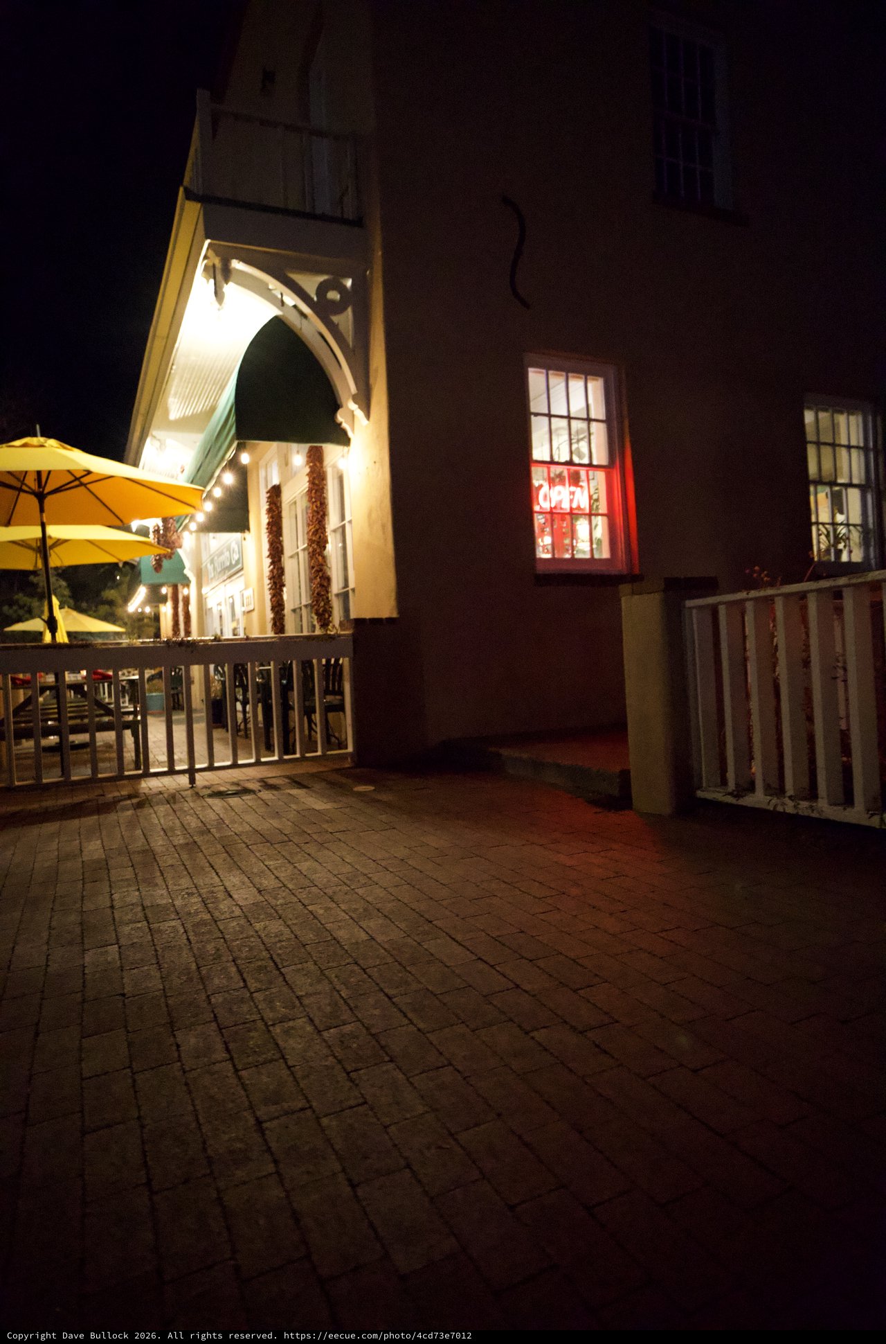 Illuminated Courtyard Dining Area at Night in Santa Fe
