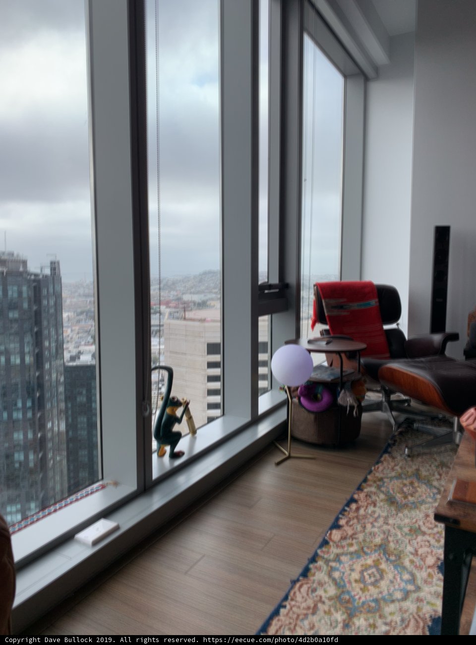 Man in a Penthouse with a View of San Francisco