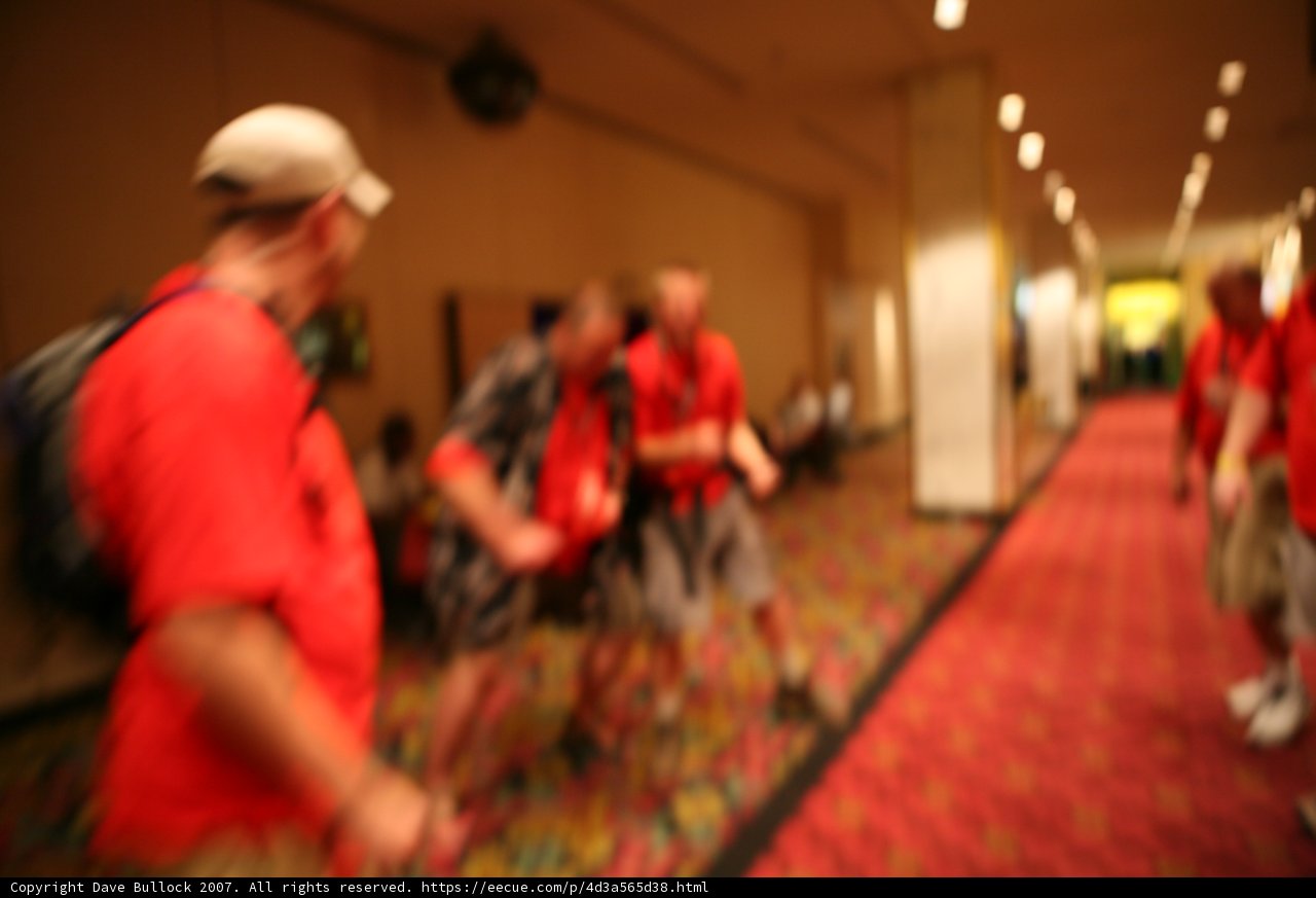 Blurry Corridor Crowded with Six Stylish People