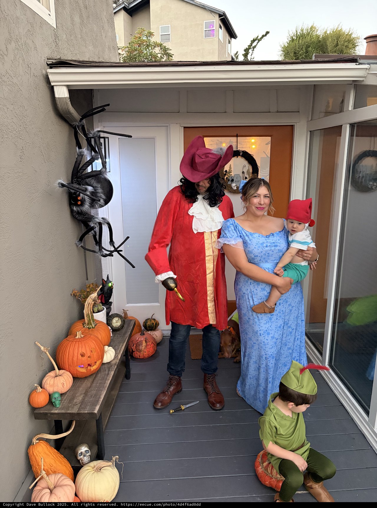 Peter Pan Family Halloween Costume on Decorated Porch
