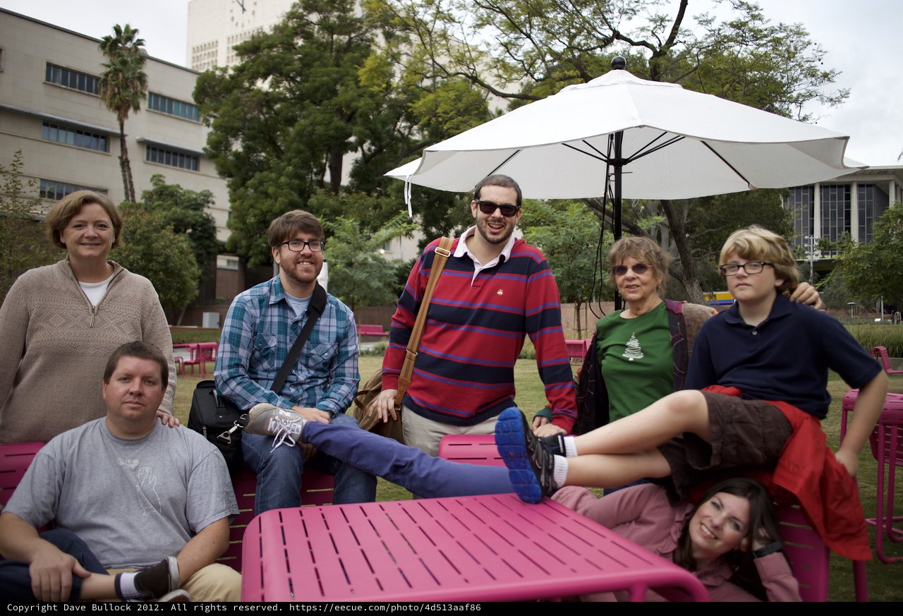 Friends and Family Gathering at Pink Outdoor Tables