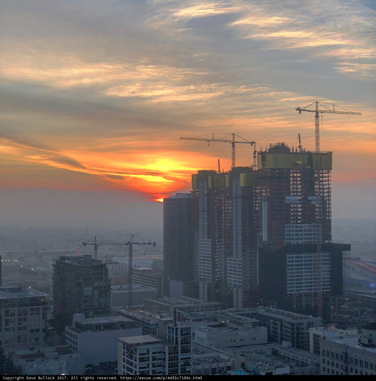 Skyline Construction at Sunset