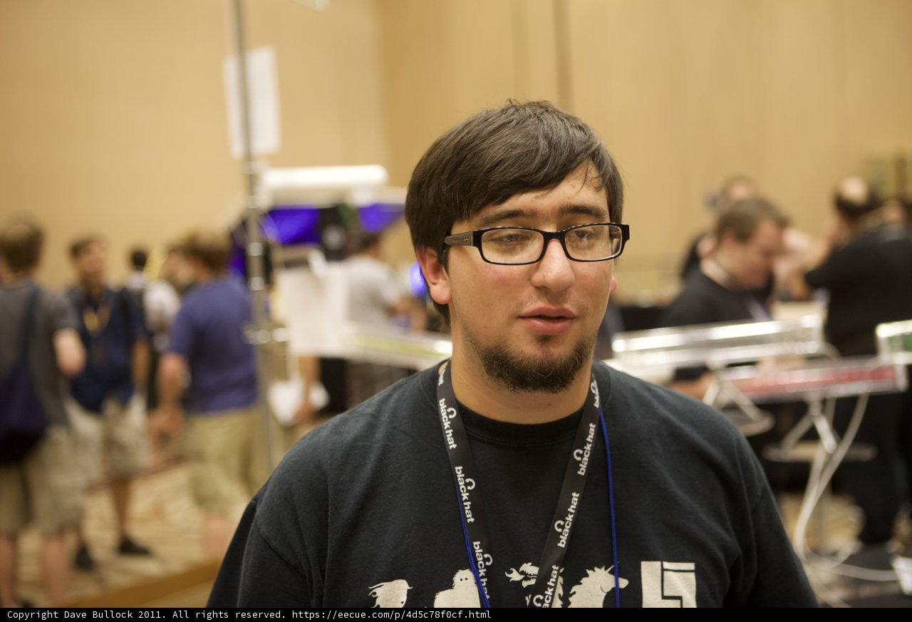 Man with Glasses Captivates a Crowd