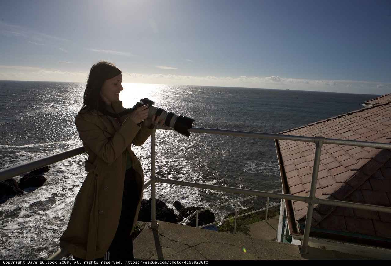 Photographer Capturing the Pacific from Cliff's Edge