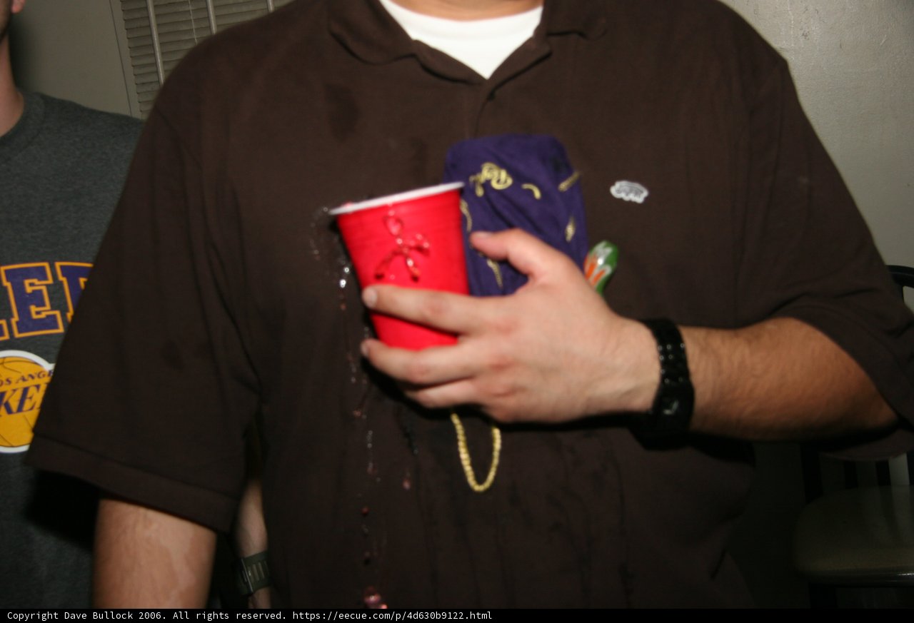 Brown Shirted Men Enjoying a Hot Cup of Coffee