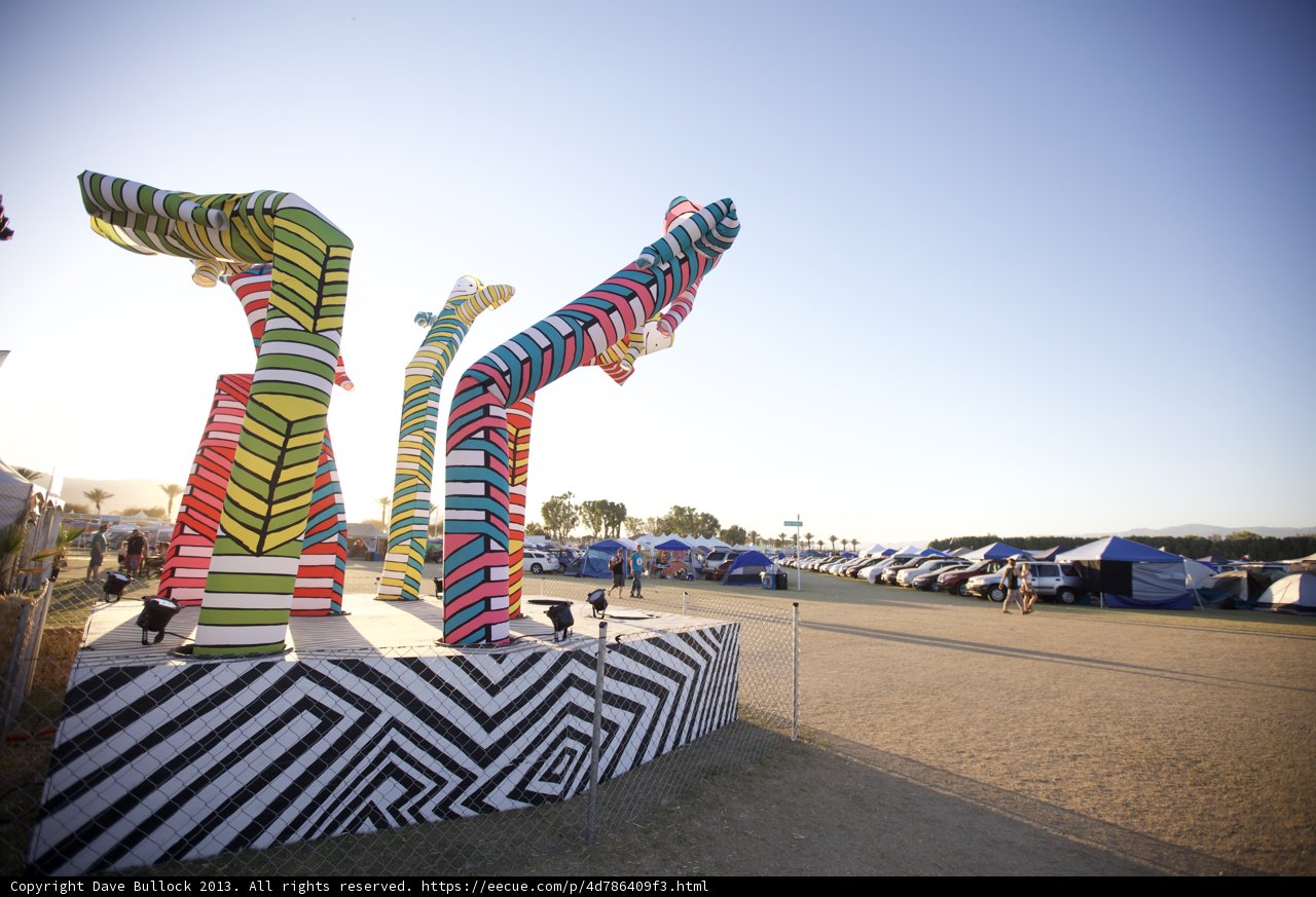 Colorful Sculpture Stands Tall in Open Field