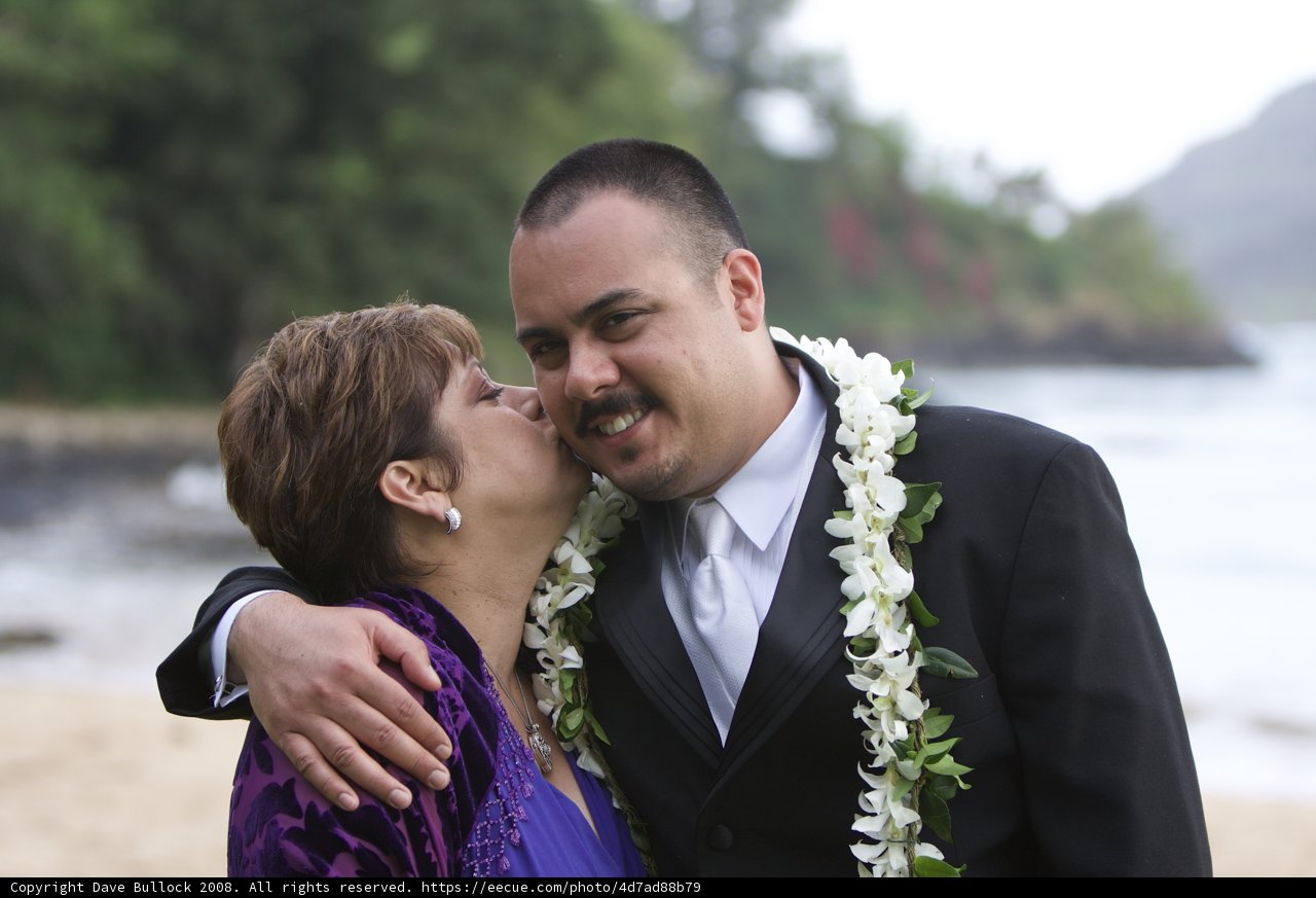 A Romantic Beach Wedding Kiss