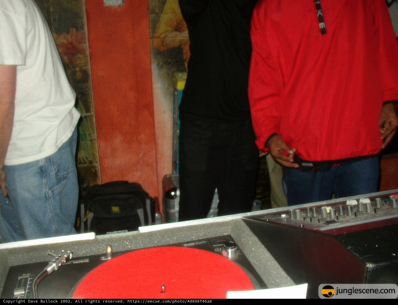 Red Jacketed Man in the Club
