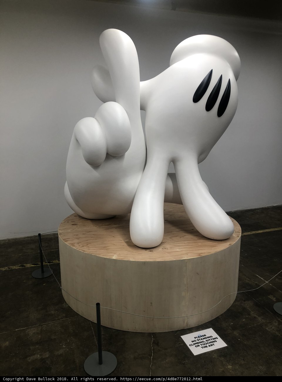 Mickey Mouse Sculpture Holding Hand