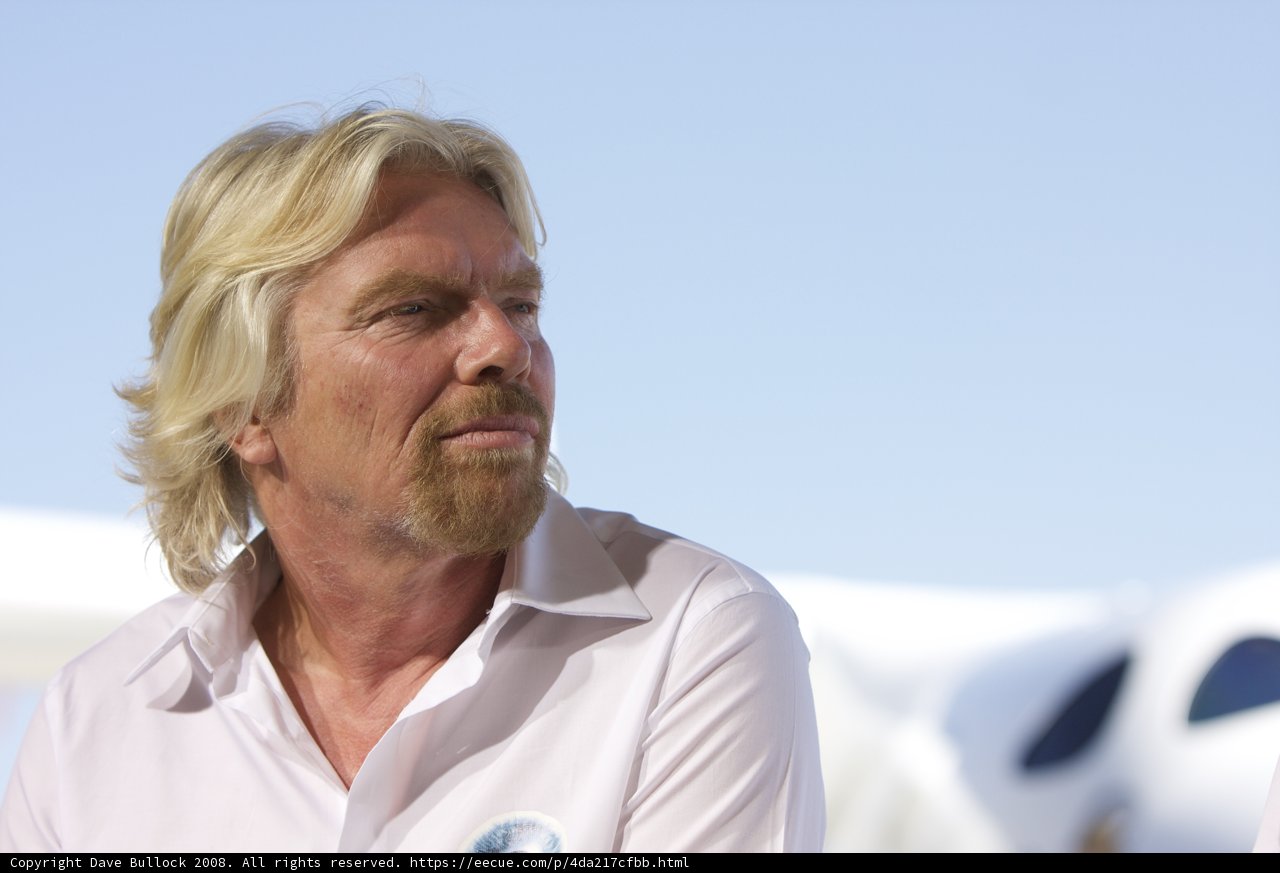 Richard Branson sits in front of the White Knight Two