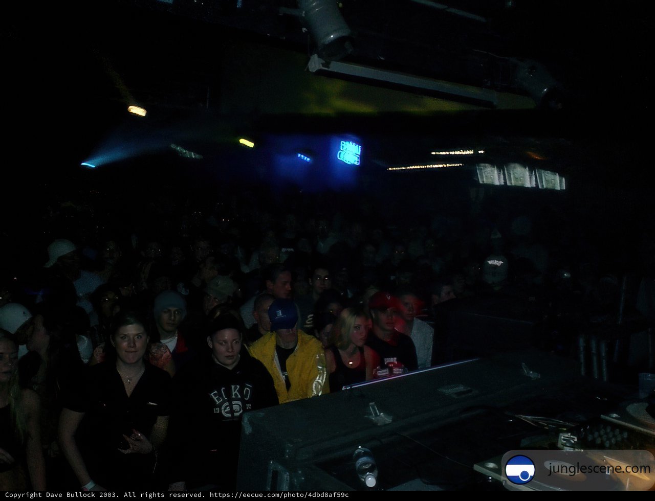 Nightclub Concert Featuring DJ and Crowd