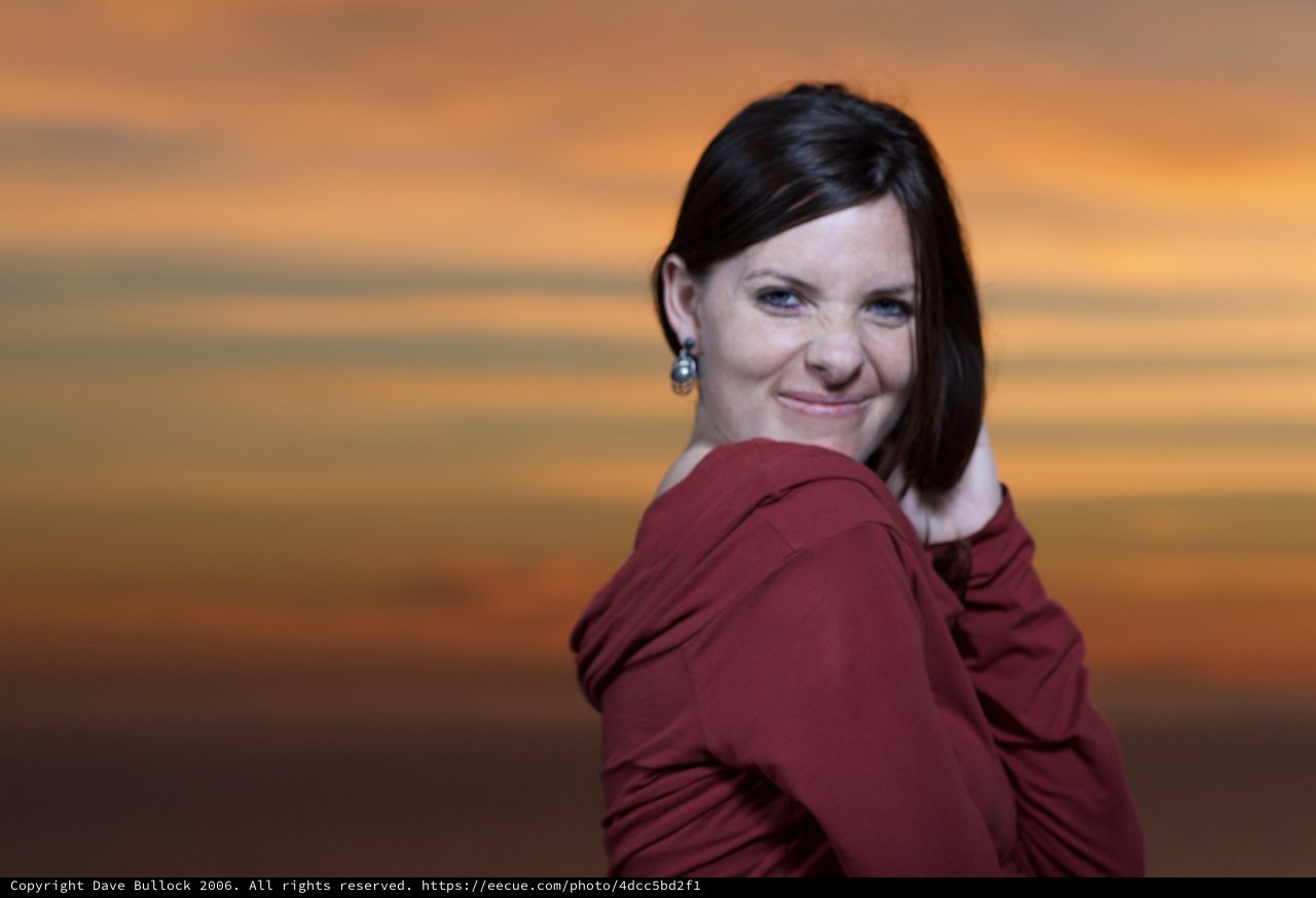 Sunset Portrait of a Woman in Crimson