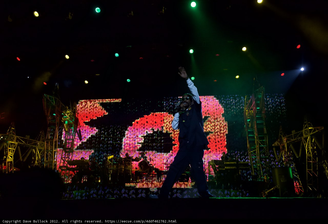 Snoop Dogg Rocks the Stage with Arms Up