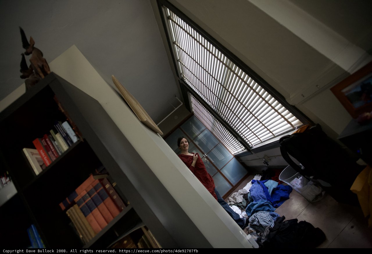 Woman Admiring the View from Her Living Room Window