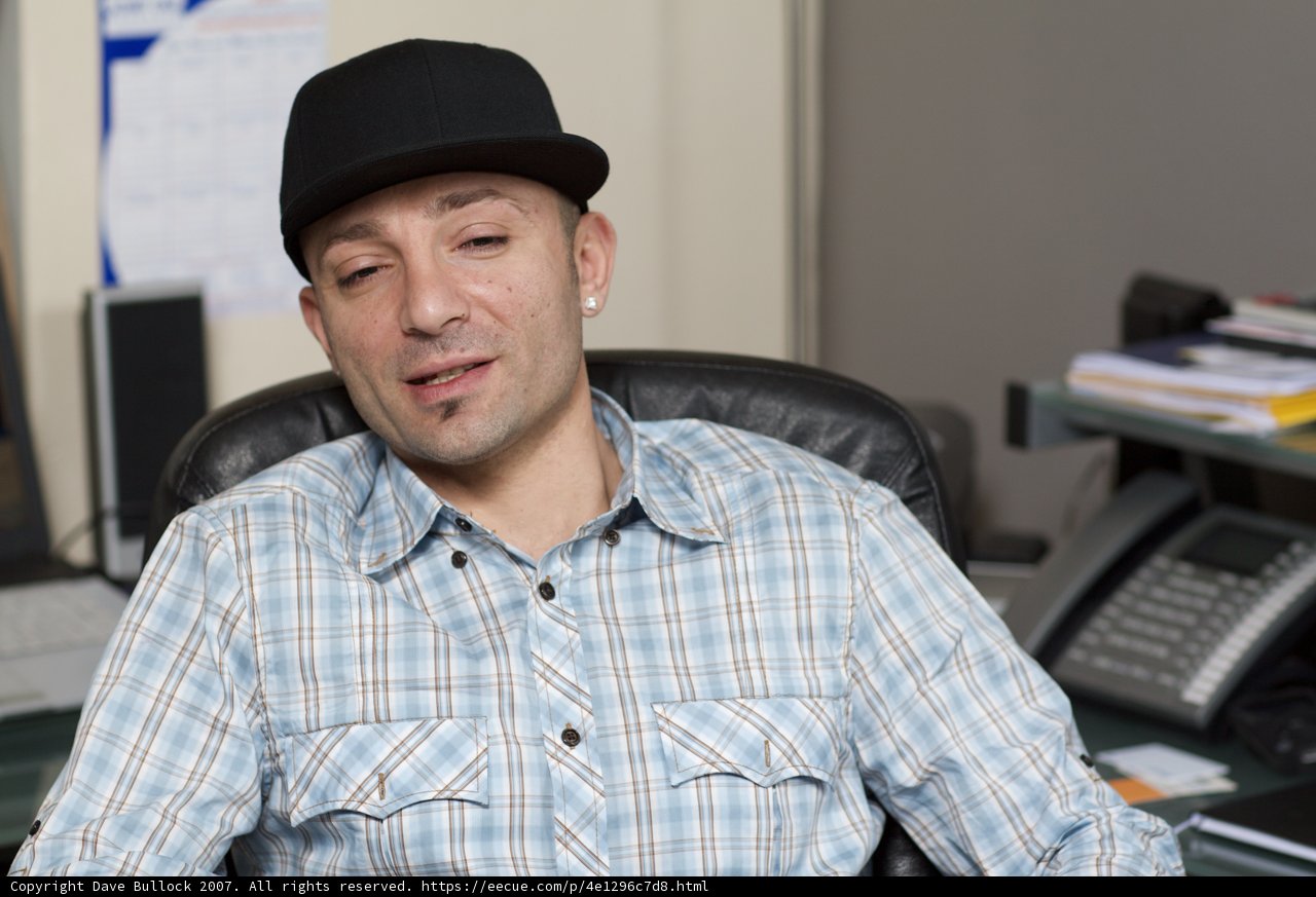 Fedora man at his desk