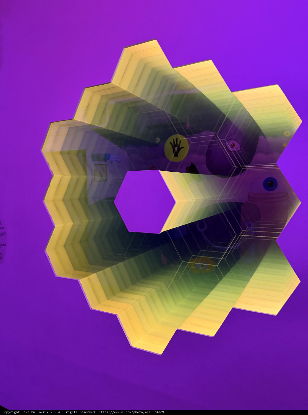 Hexagonal Geometric Art Installation with Prismatic Reflections