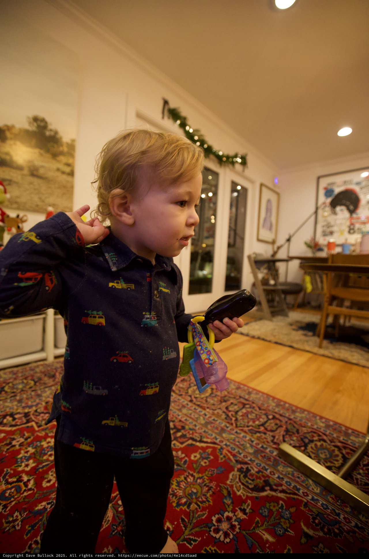 Toddler on Christmas Morning with Remote Control