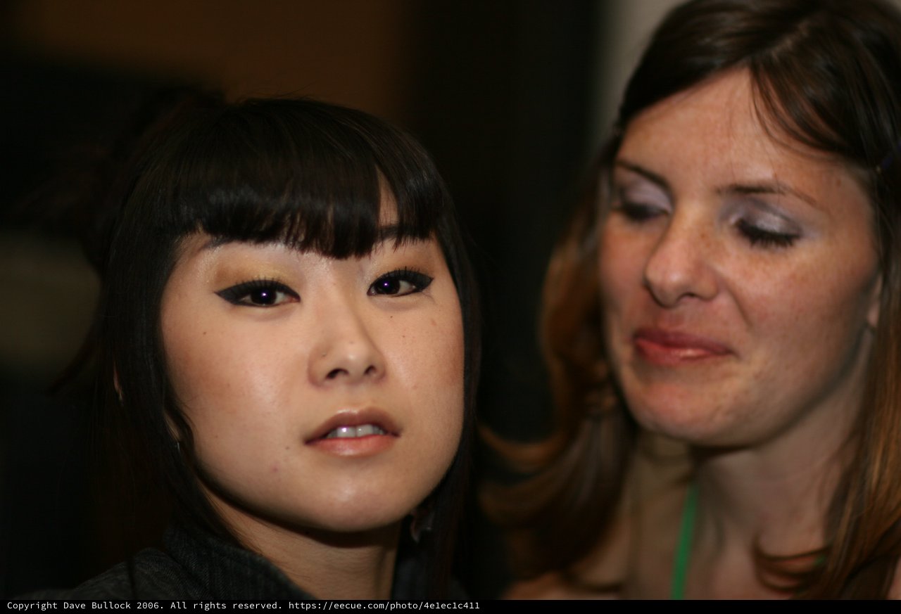 Two Women Share a Quiet Moment at Event