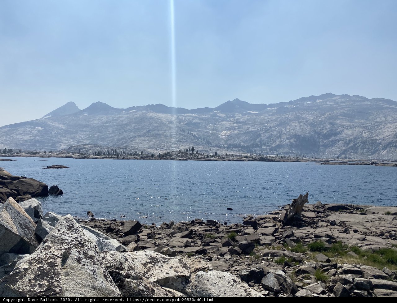 Majestic View of the Mountains and Water from Rocky Shore