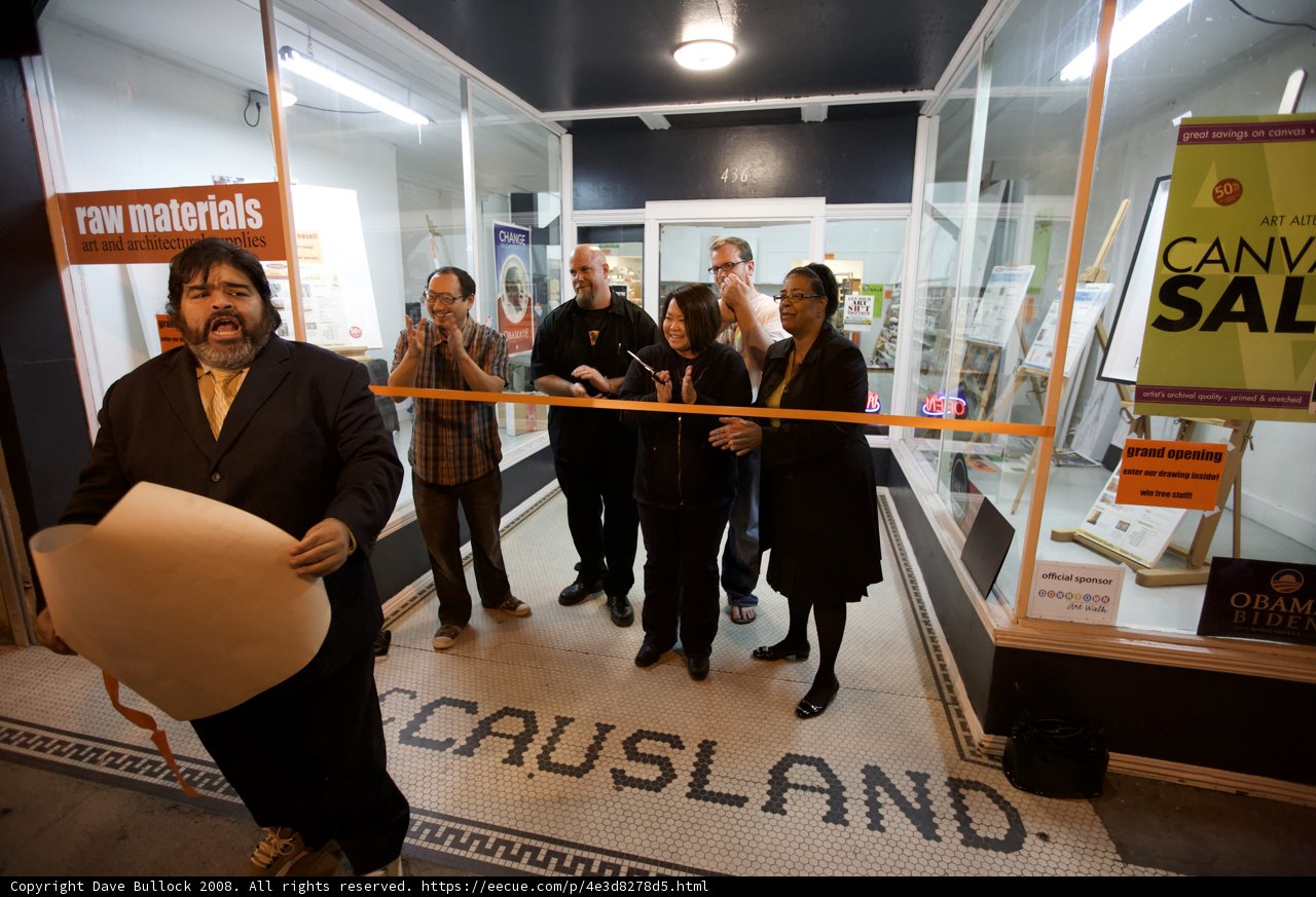 Group of People in Front of 10 Shoes Store